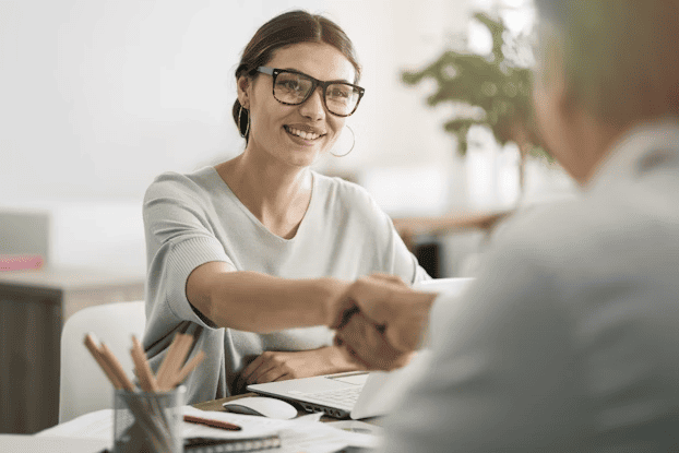 New employee finalising a professional agreement in an office